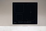 Indesit-Piano-cottura-IB-65B60-NE-Nero-Induction-vitroceramic-Lifestyle-frontal