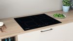 Indesit Piano cottura IS 83Q60 NE Nero Induction vitroceramic Lifestyle perspective